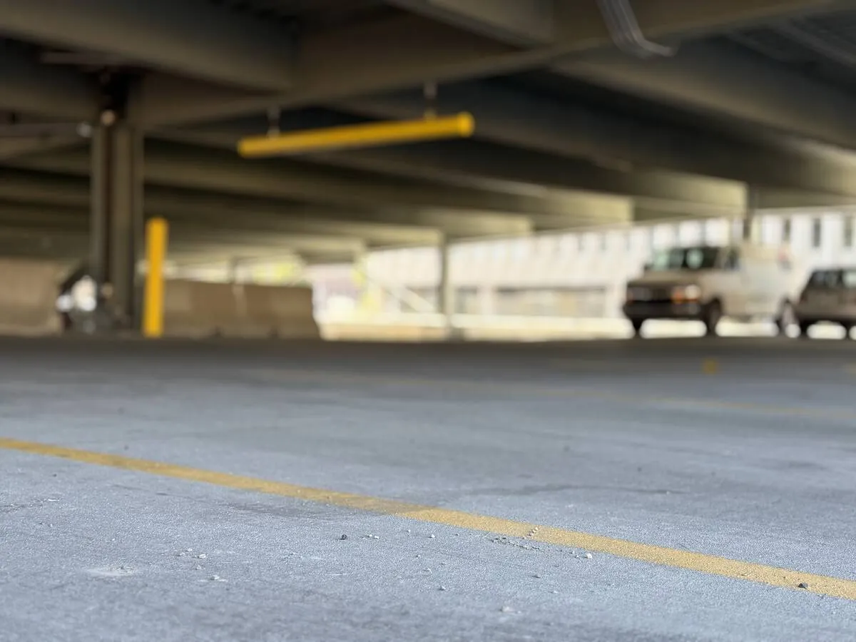 Shuttle van inside the covered garage